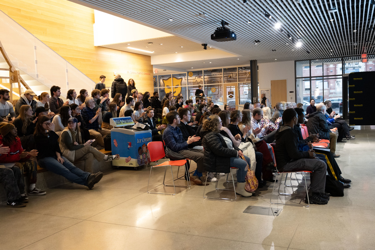 Architecture students attend the Dean's award ceremony in the CEIS lobby