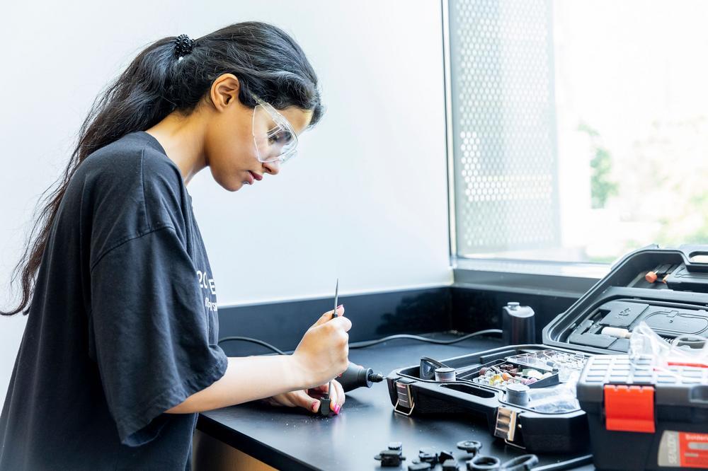student working on project