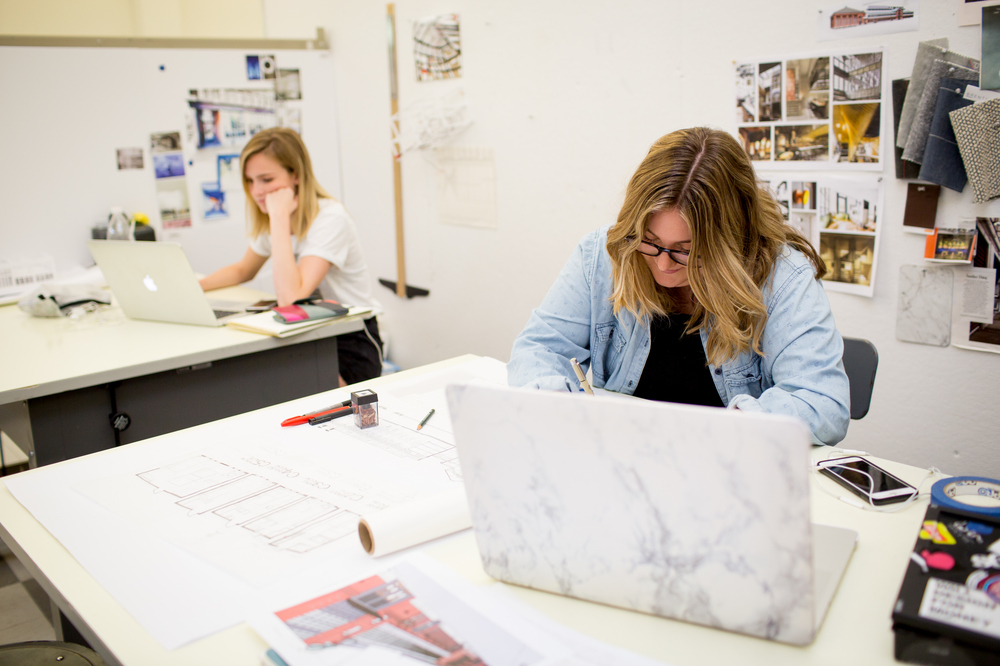 students working on designs