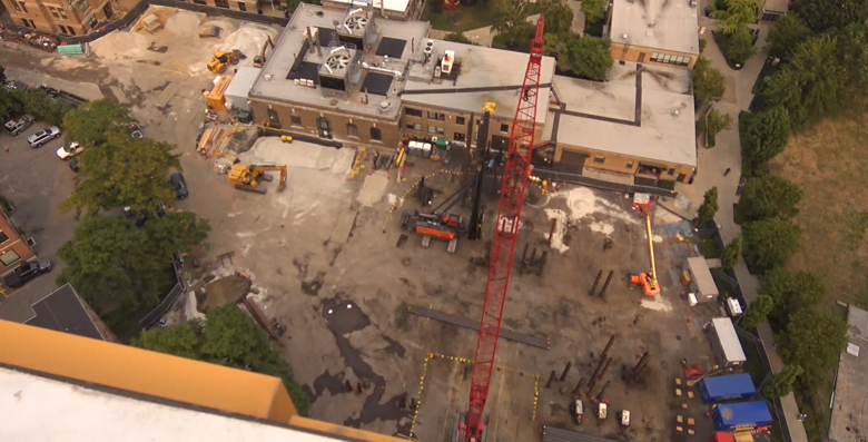 A view of piles being driven for the First Year Tower from above