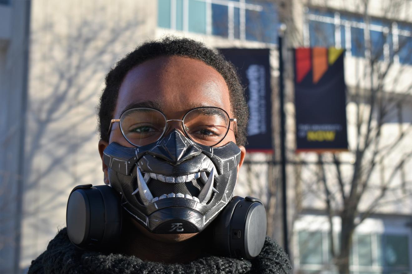 man wearing a mask outside