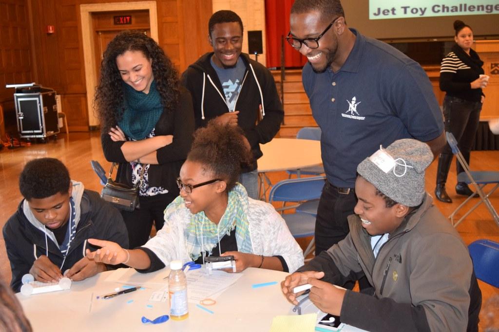 NSBE students with young people during a STEM day