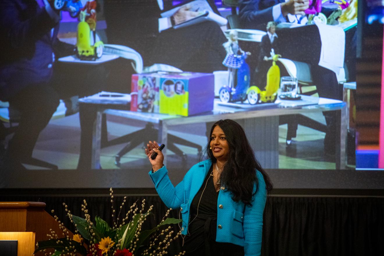 woman speaking at a podium