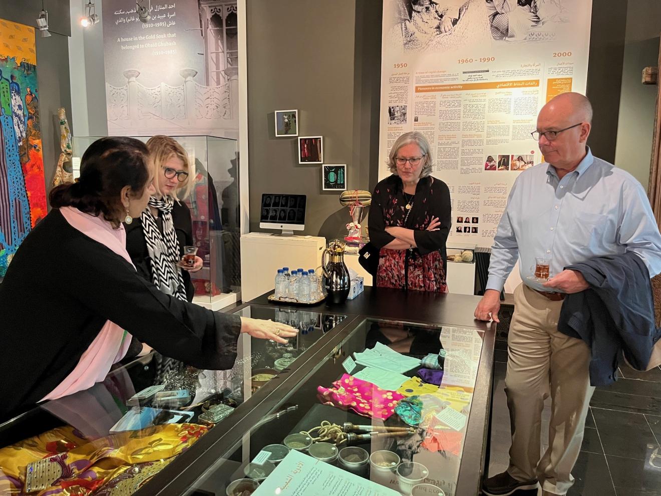 group of people touring a museum