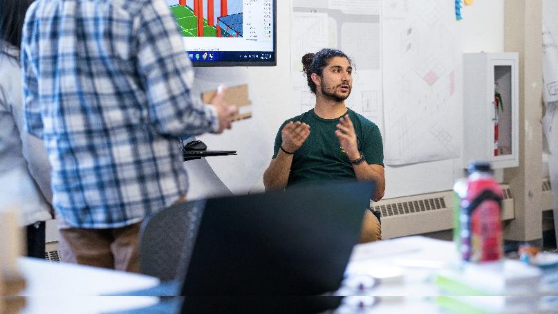 man speaking to a class