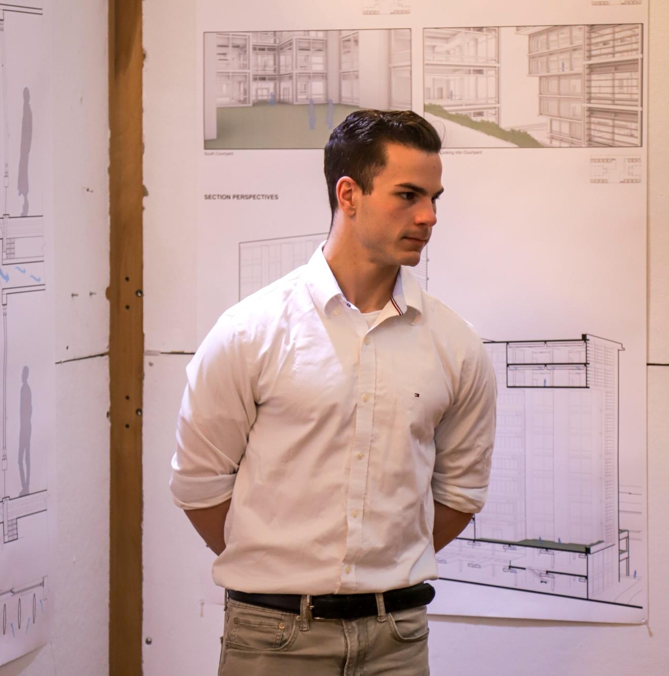 man standing in an architecture studio
