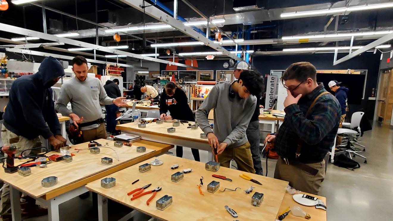 students at a worktable 