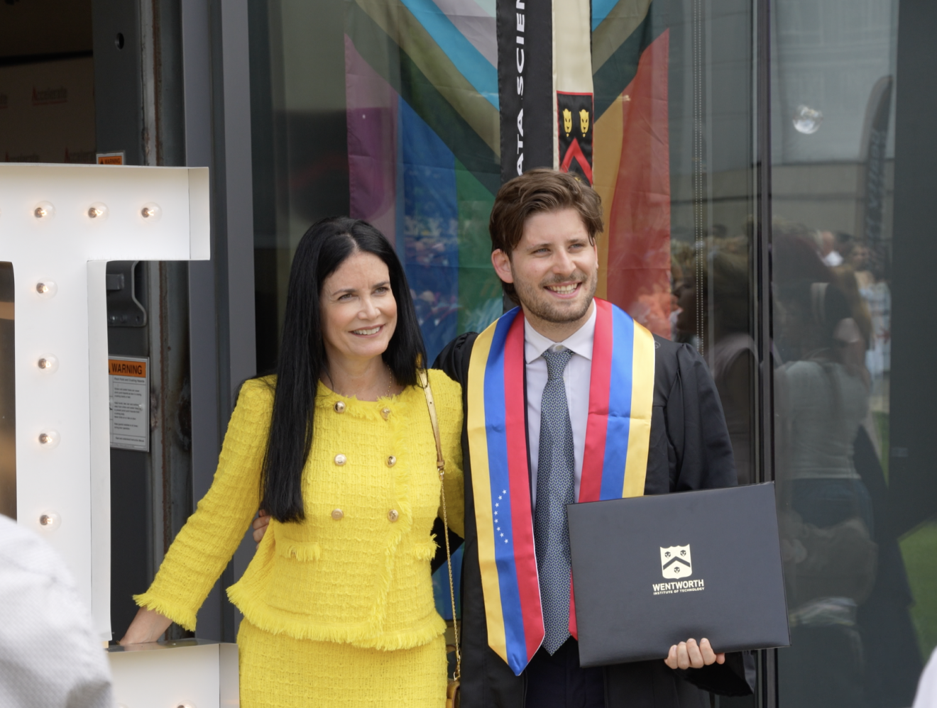 two people at a graduation ceremony