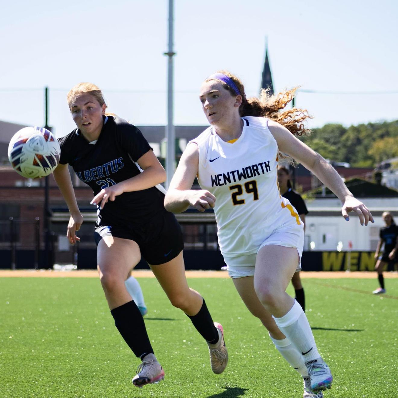 women on a soccer field