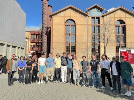 A group of people standing in front of university buildings in Istanbul
