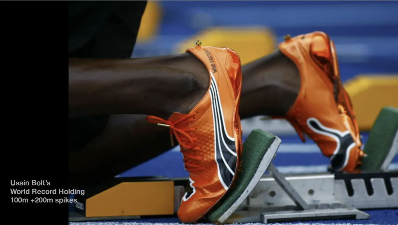 a man wearing sneakers about to take part in a race