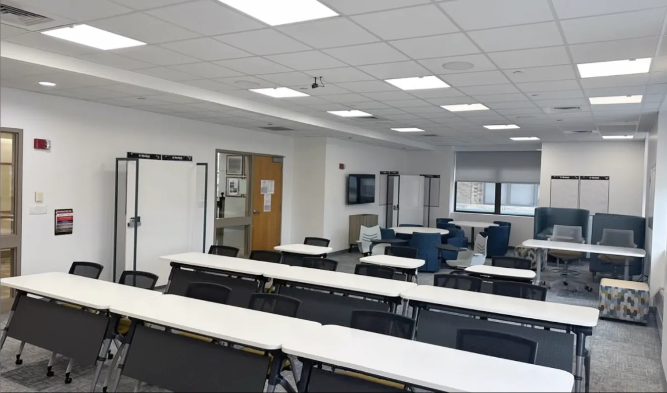 a bright classroom with desks