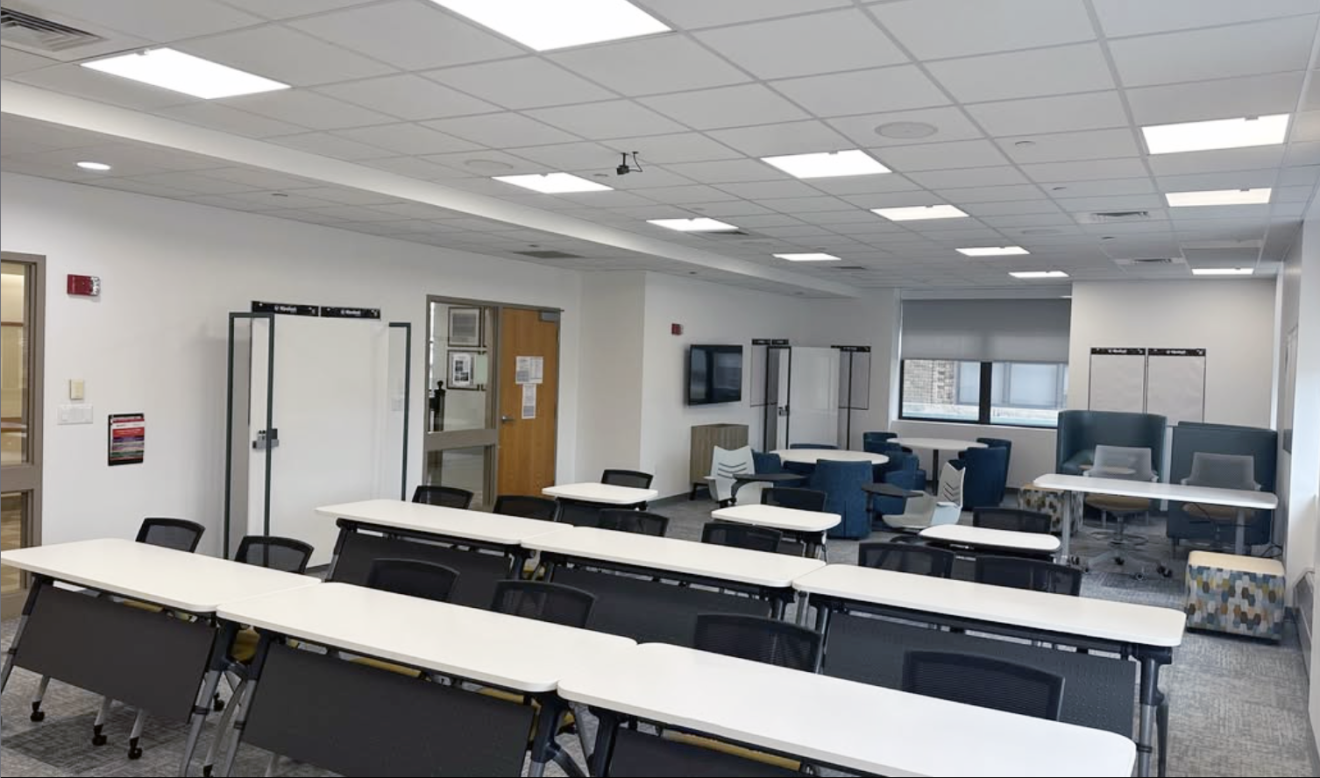 a bright classroom with desks