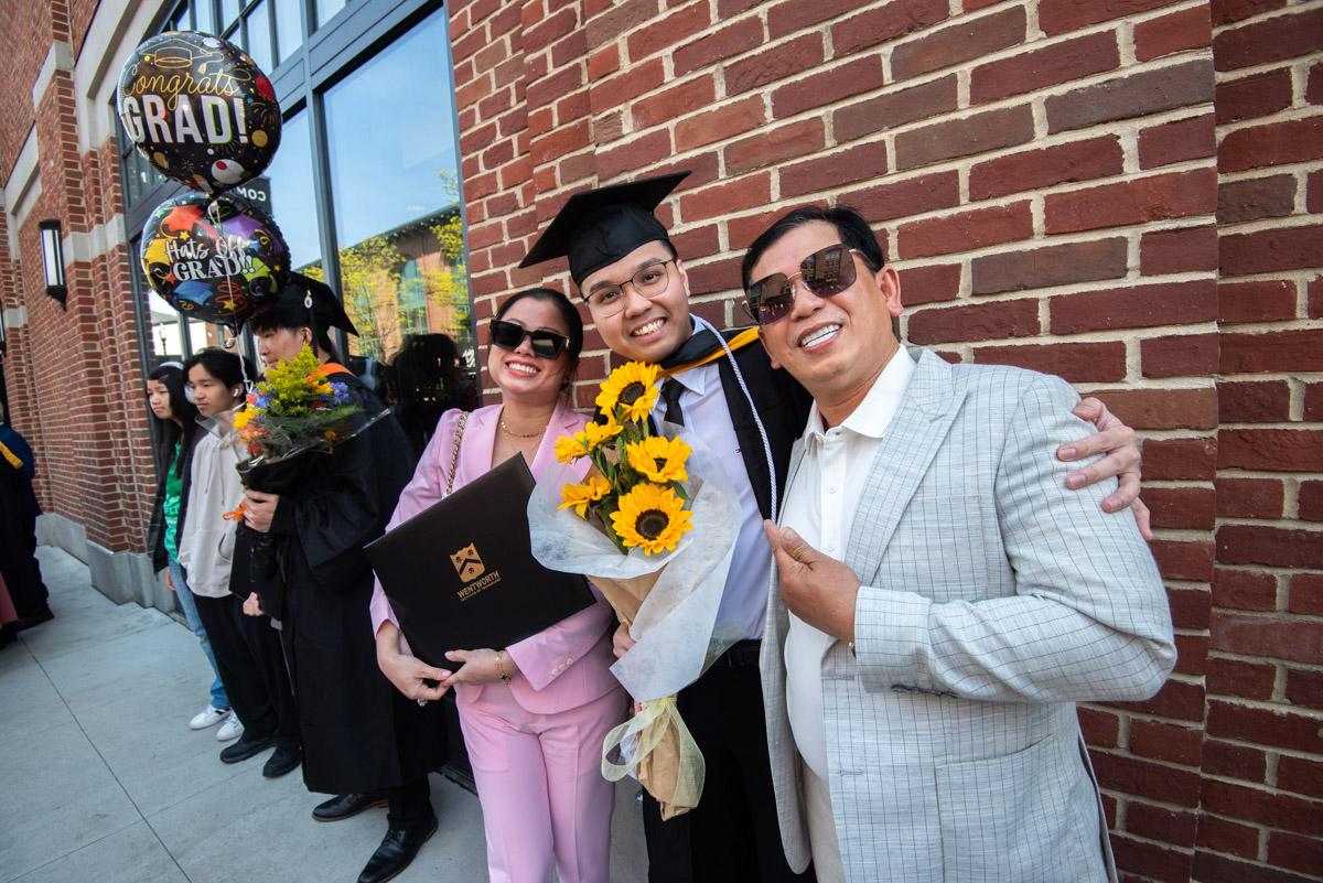 people smiling for the camera