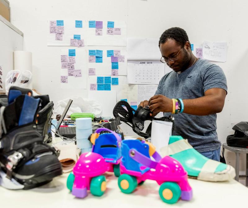 A student works on sneaker design in the industrial design lab