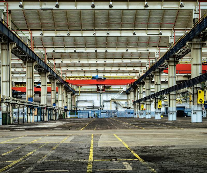 A picture of a large warehouse as seen from the inside