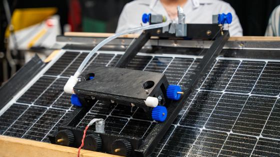 up close picture of a robotic item on top of a solar panel