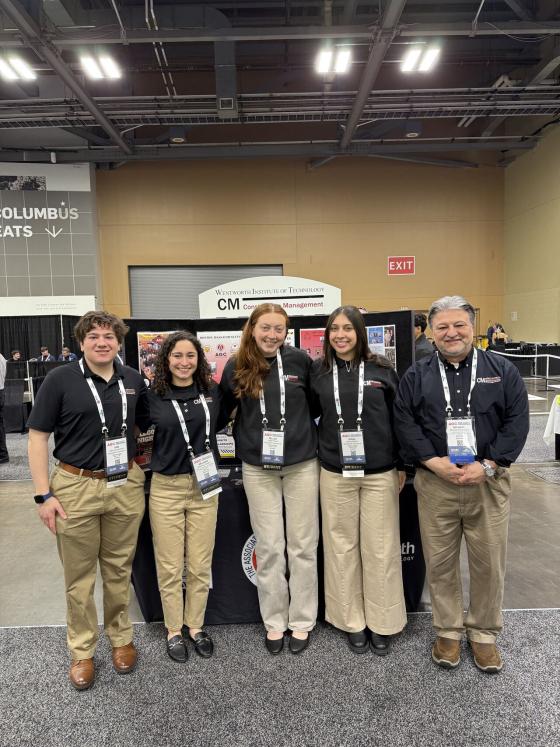 a group of people at a conference