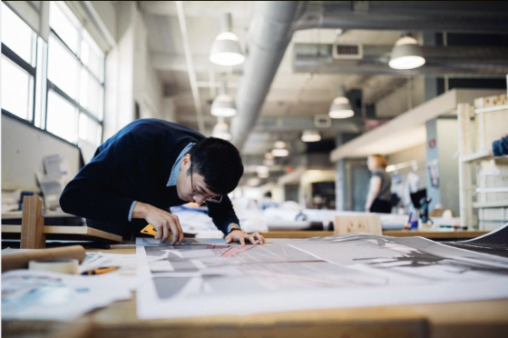 a student works in an architecture studio
