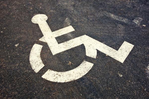 The wheelchair symbol for parking