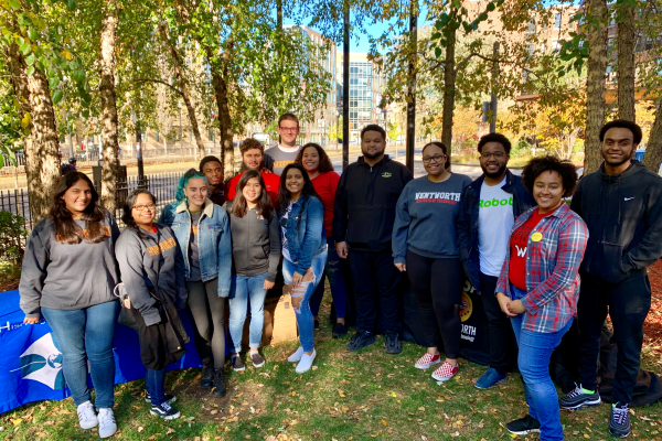 students at an outdoor barbecue