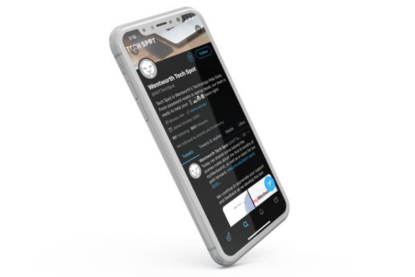A cellphone with the Tech Spot Twitter on the screen 