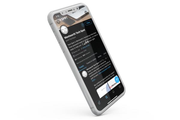 A cellphone with the Tech Spot Twitter on the screen