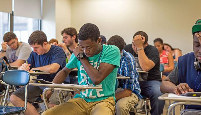 Students at desks in classroom