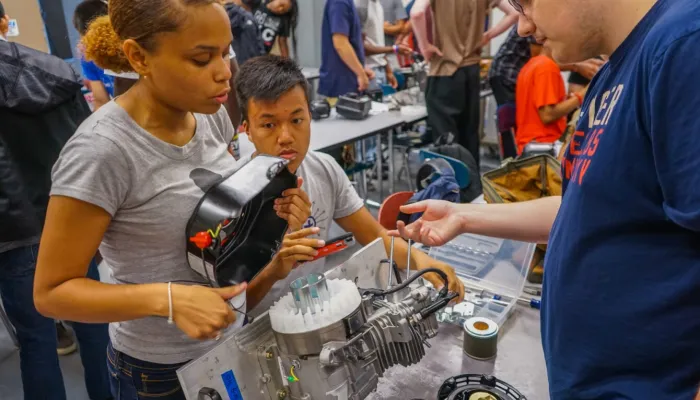 students building a machine