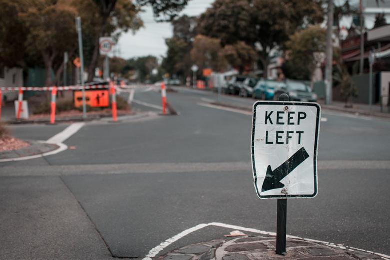 A street sign "Keep Left"