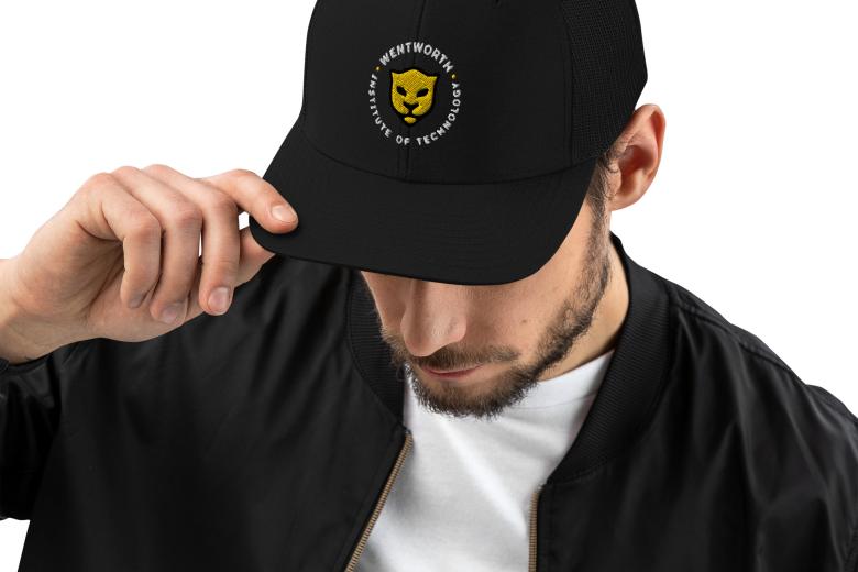 Man wearing Wentworth branded trucker hat