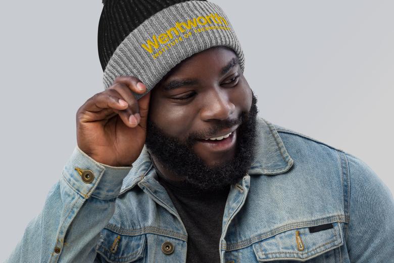 Man wearing Wentworth branded beanie hat