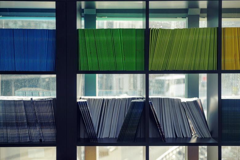 File folders on a library shelf