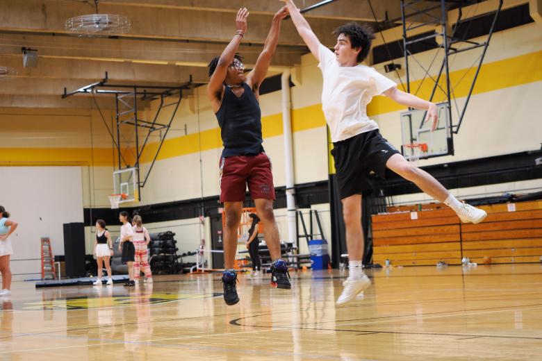 students playing basketball