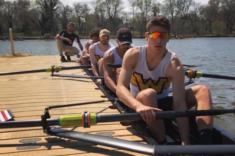 rowing team in boat