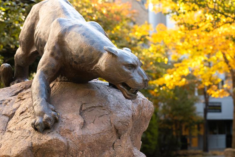 The Wentworth leopard statue with Autumn leaves in the background