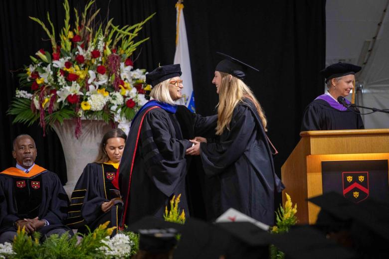 Faculty members on the dais at Wentworth Commencement 2023