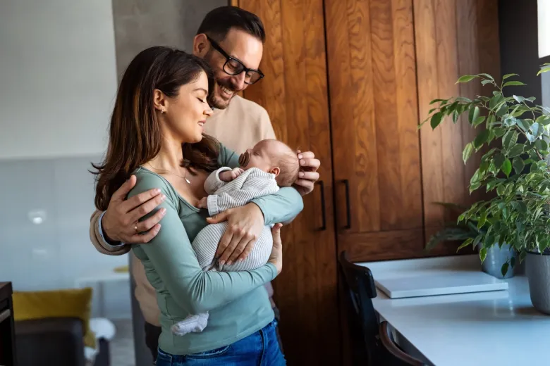 parents with newborn baby