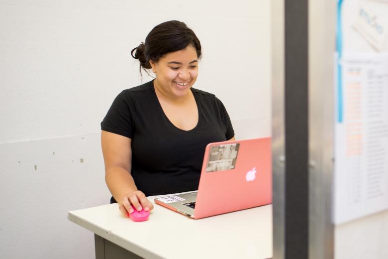 Student looking at laptop screen