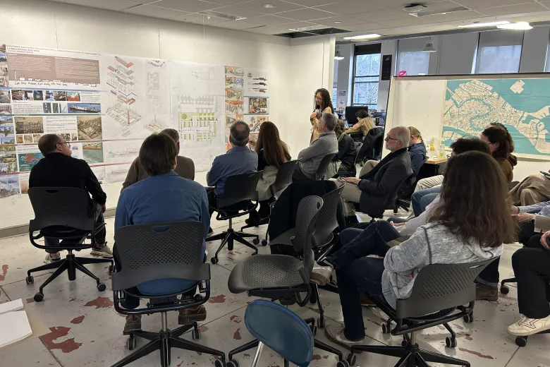 Student presenting work to an audience
