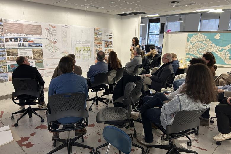 Student presenting work to an audience