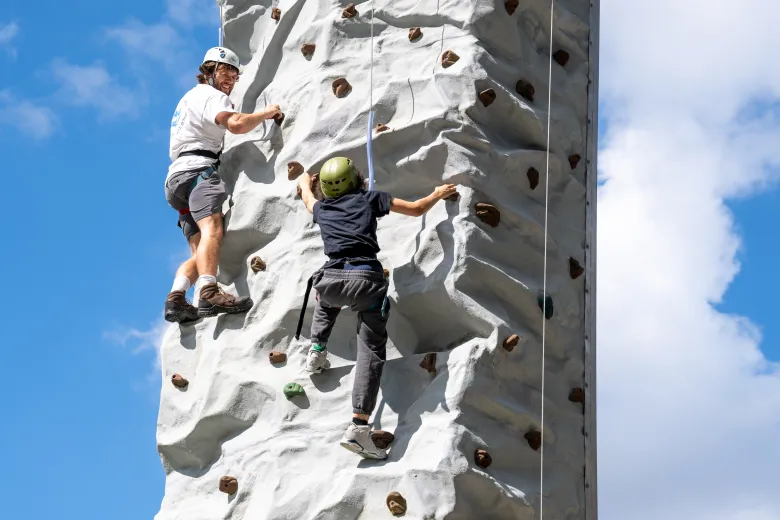 Two students rock climbing