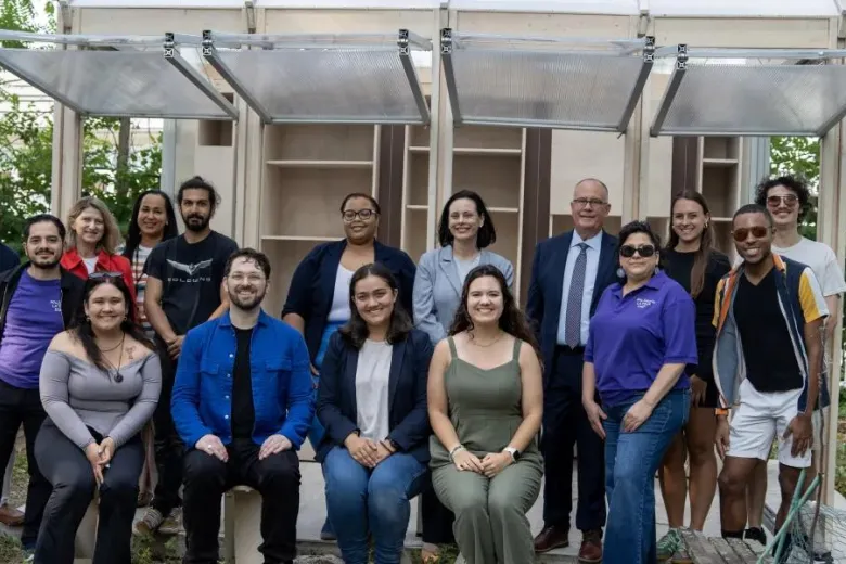 Community partners, Staff, students, and administrators celebrate the greenhouse 