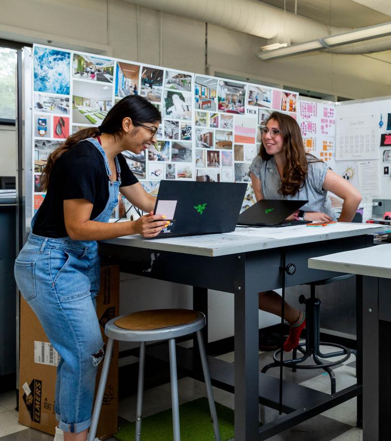 Students in a studio at their laptops