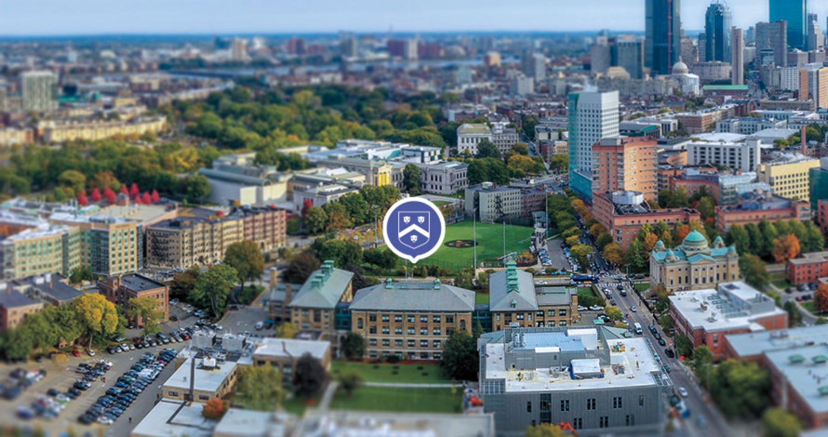 An aerial view of the Wentworth campus with a purple location pin graphic over the campus.