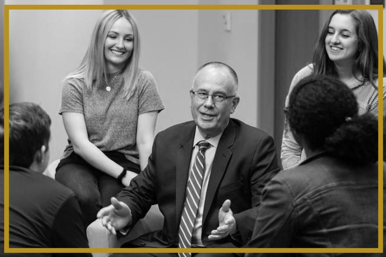 President Mark Thompson surrounded by Wentworth students
