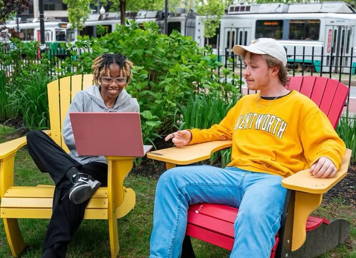 Students working together on a laptop