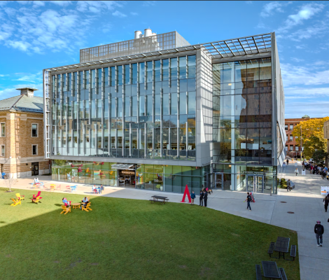 aerial view of a modern building and a grassy quad