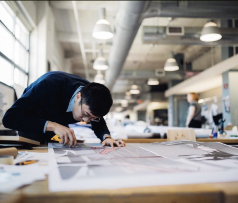 a student works in an architecture studio