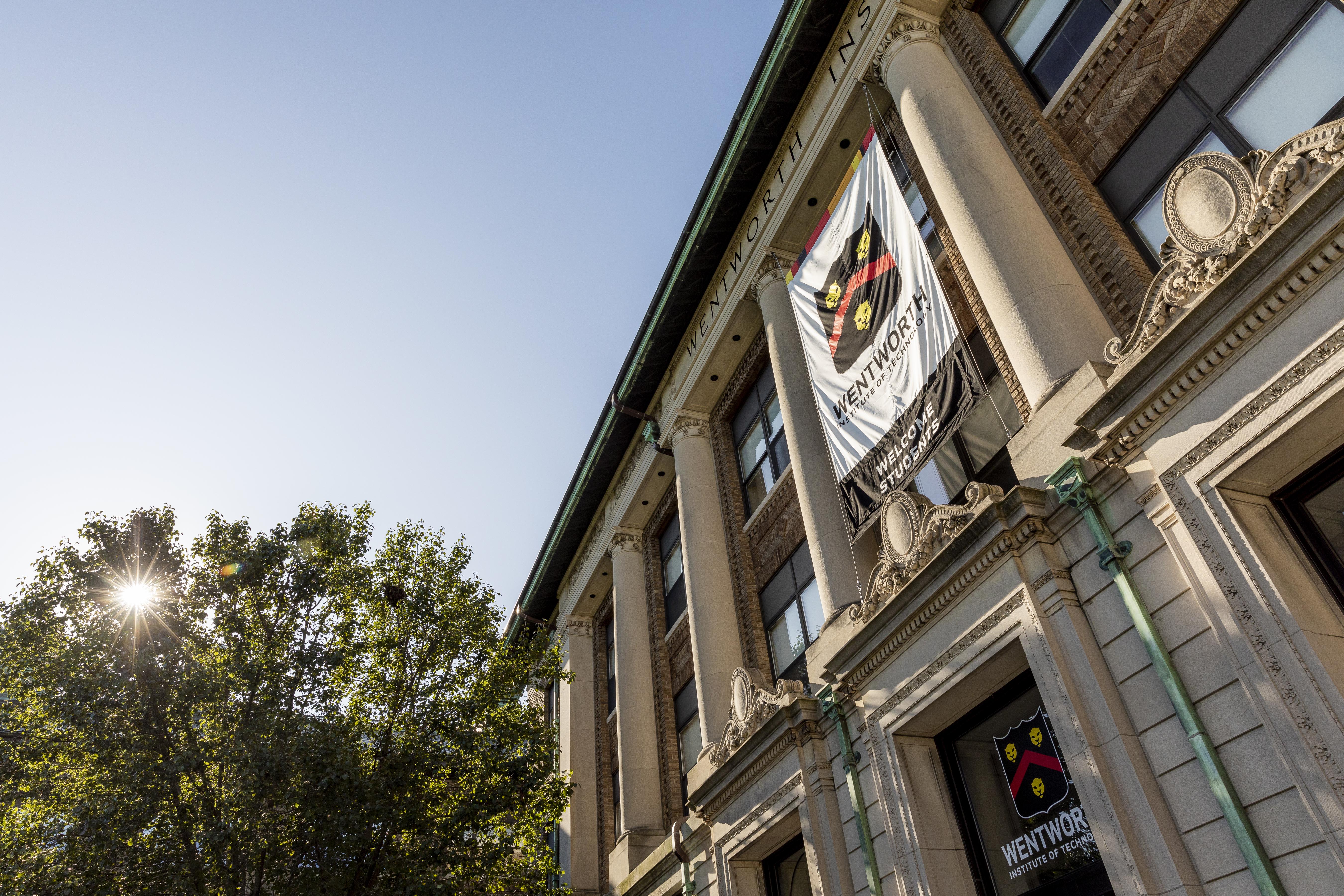 Outside photo of Wentworth Hall on a sunny day.